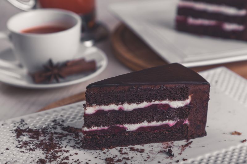 Honey cake slice with cream cheese frosting